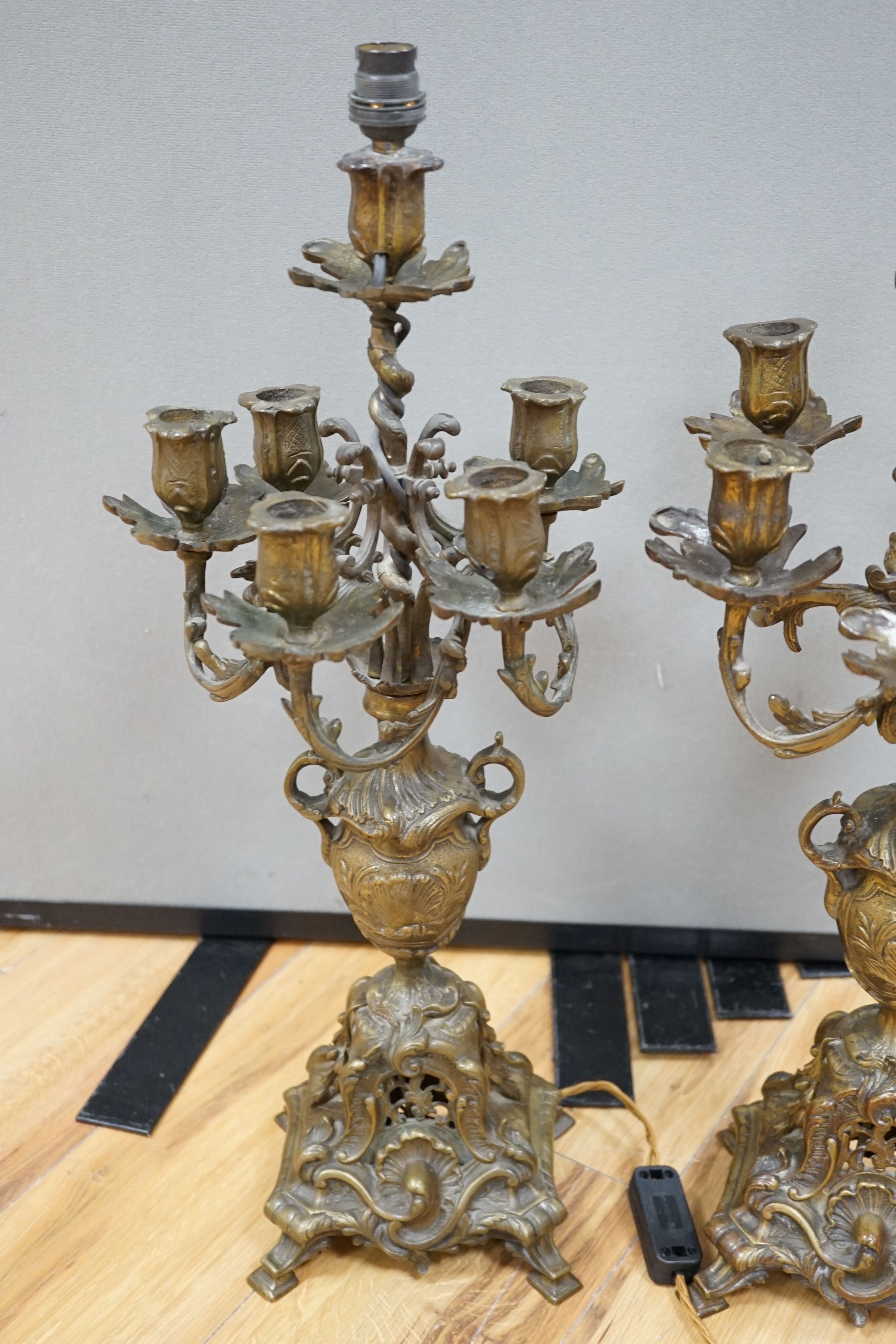 A pair of French bronze or brass six light candelabra 60cm